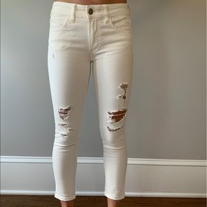 Ripped white cropped super stretch skinny jeans